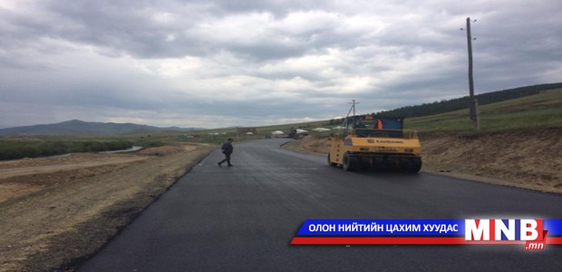 Богд уулын арын замд суурь хучилт хийлээ